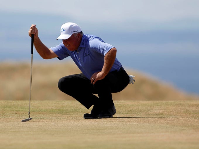 Mark O'Meara at the 11th green during the first round of the 2013 The Open Championship at Muirfield Golf Club.