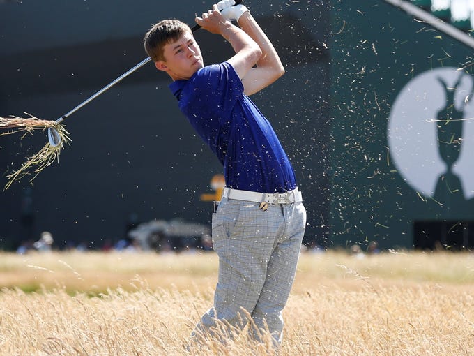 Matthew Fitzpatrick of England plays out of the rough on the 10th hole