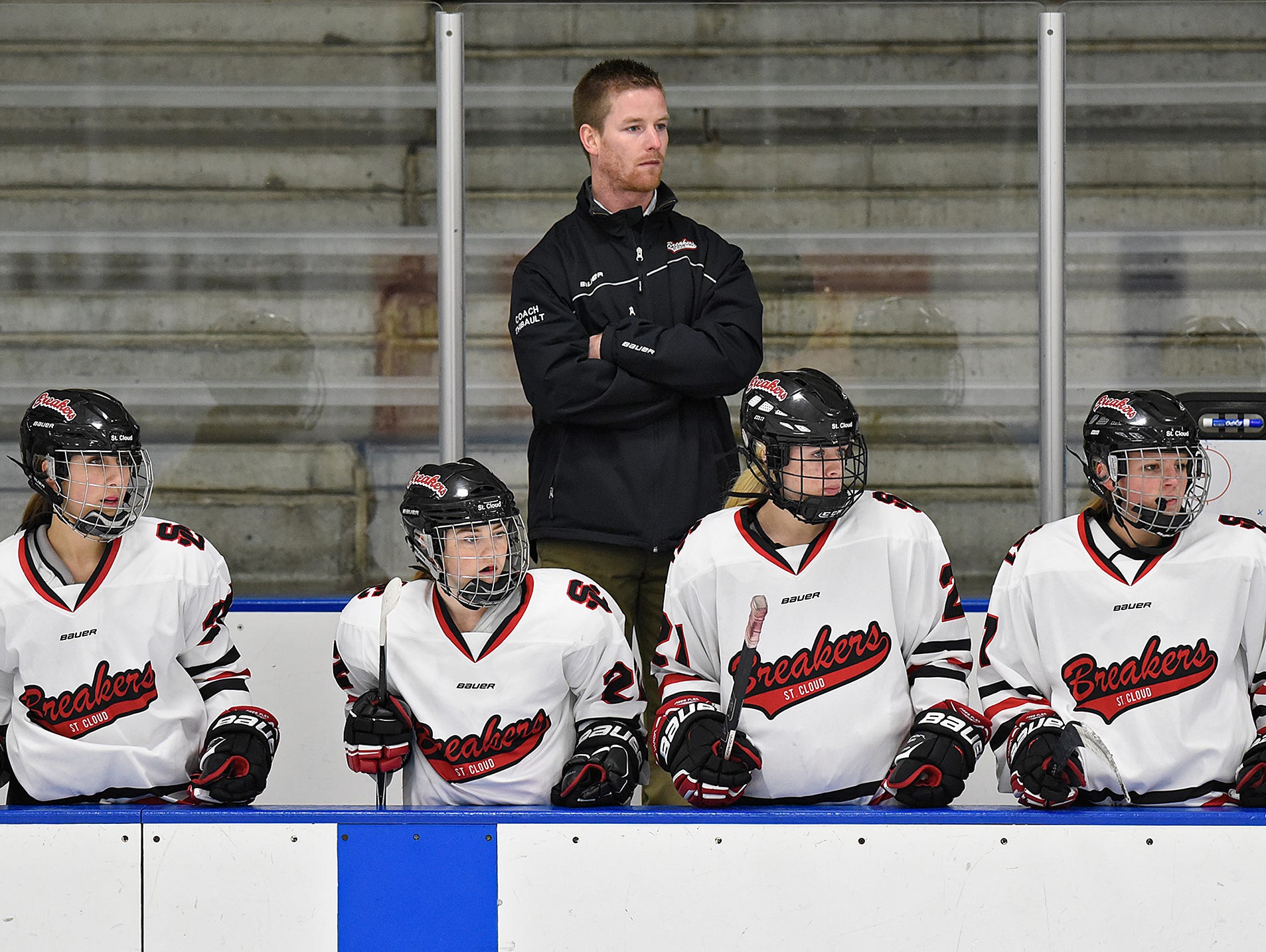 Nick Thibault watches his team from the bench during a game Thursday at the MAC in St. Cloud. Thibault is in his first season as the head coach for the St. Cloud Icebreakers.