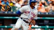 Aug. 7: Mets outfielder Alejandro De Aza reacts after