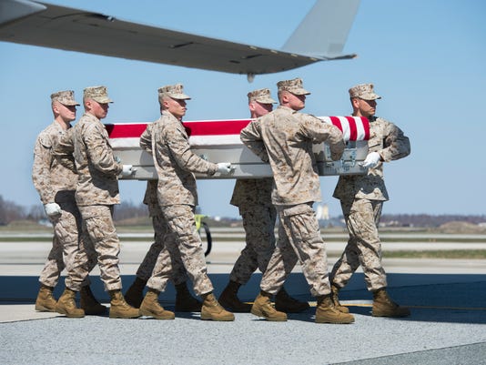 The dignified transfer of Staff Sgt. Louis F. Cardin