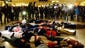People participate in a 'die-in' protest reacting to