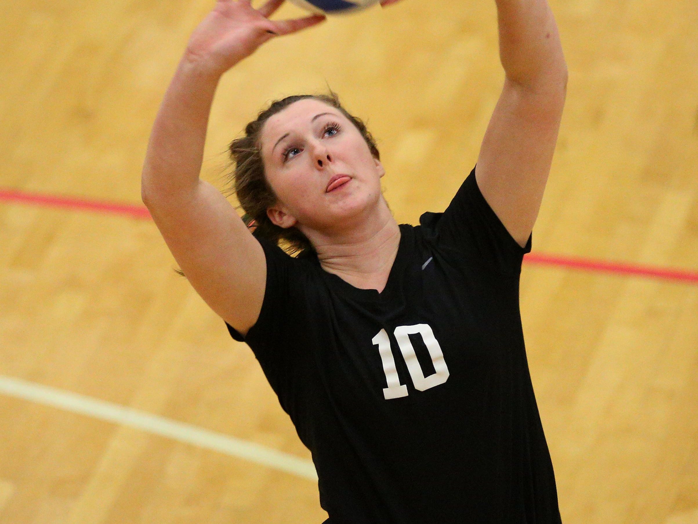 West Salem's Mattie Kelly (10) sets the ball gainst Sunset during the fourth place gameof the 6A state volleyball playoffs, Saturday, November 7, 2015, at Liberty High School in Hillsboro, Ore. West Salem lost 3-2 to place sixth.