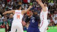 U.S. forward Carmelo Anthony (15) tries to pass out