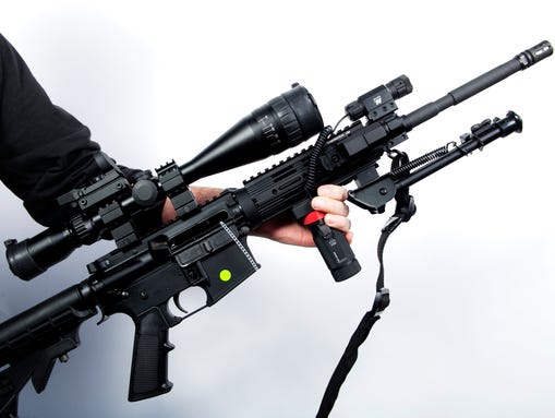 An AR-15 rifle is displayed at the Crossroads of the