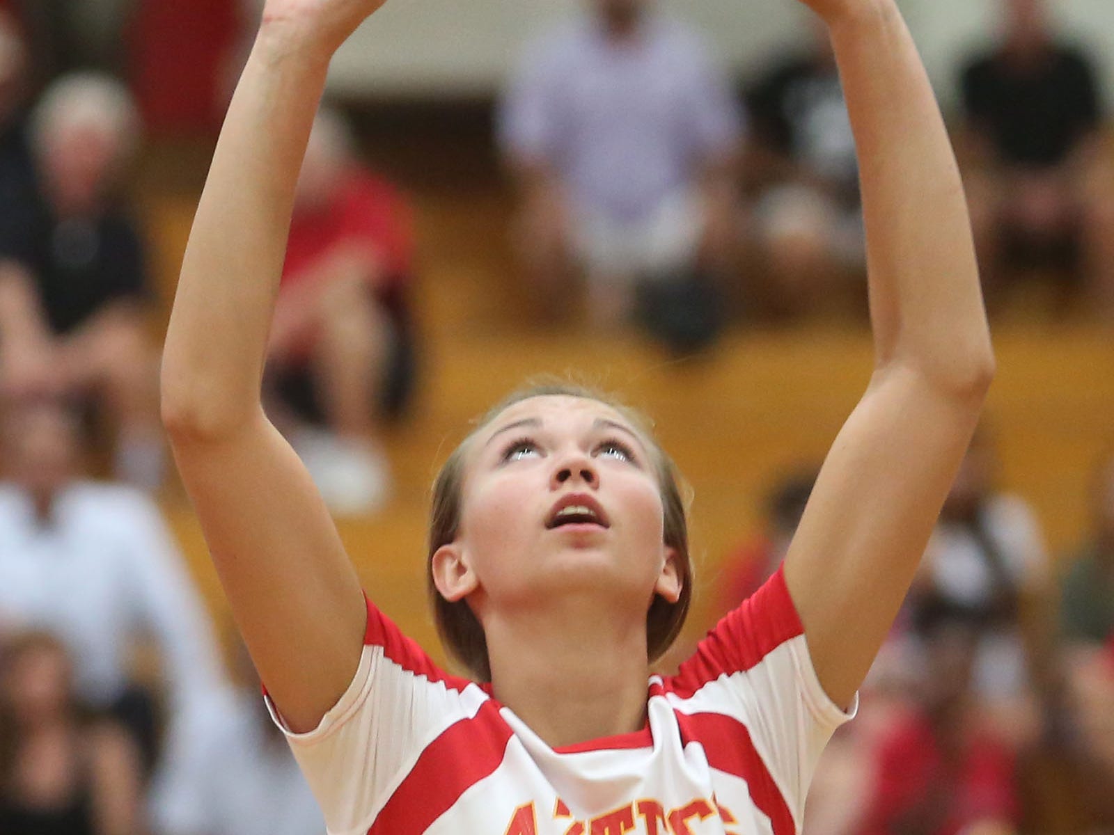 Morgan Dewyer (12) sets the ball during a win earlier this season. Dewyer and the Aztecs stormed past La Quinta on Tuesday in three games.