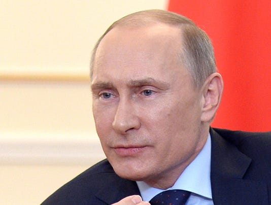 Pentagon studies Putin body language for hint of intent