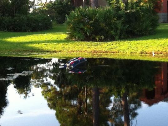 Mom, child safe after car plows into lake