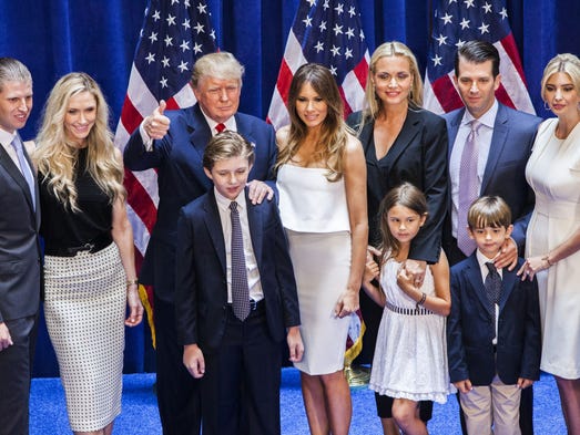The Trump family poses for photos after Donald Trump