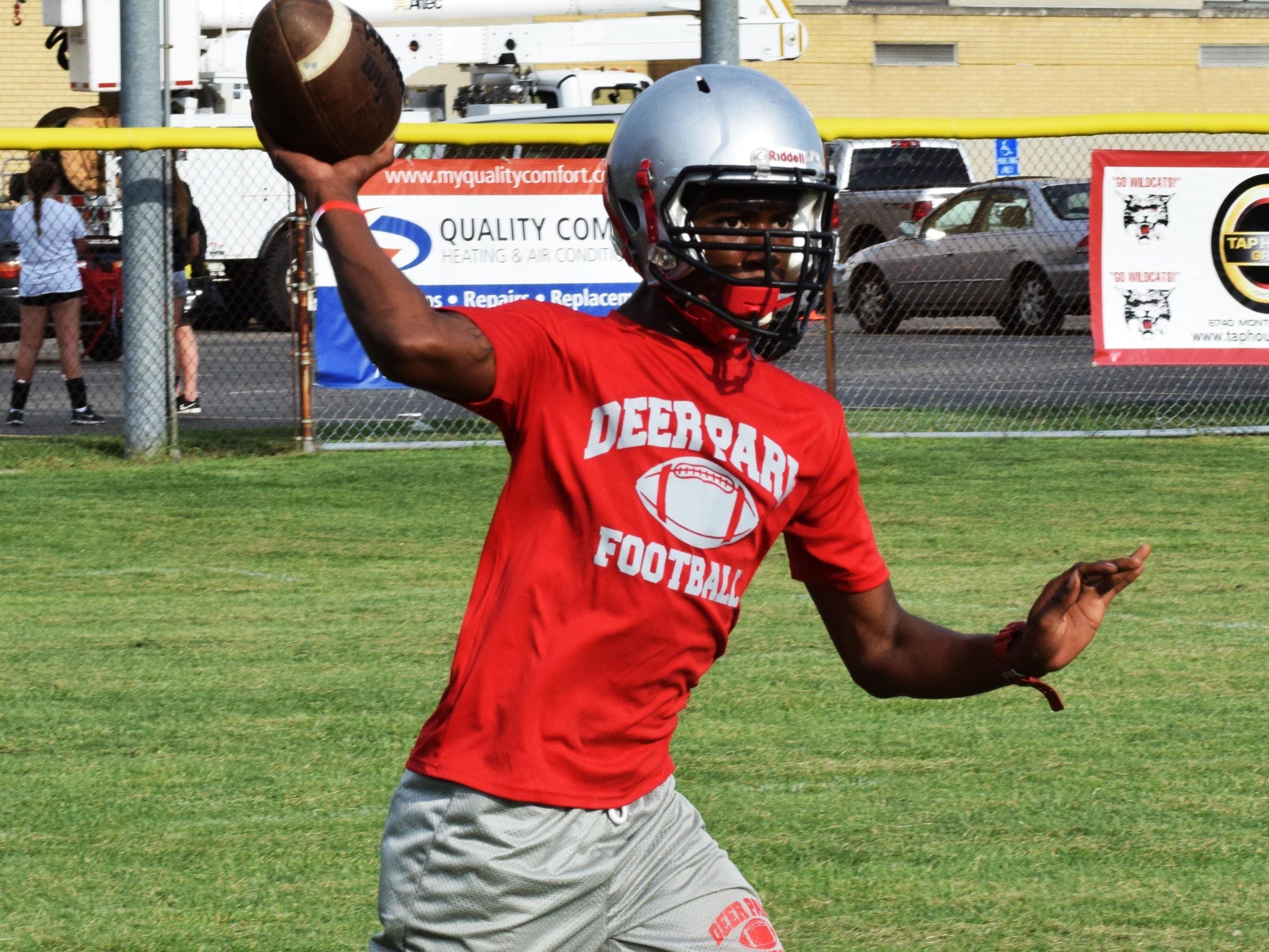 Deer Park quarterback Jordan Yelling looks to connect on a long passes in 2015 for the Wildcats.