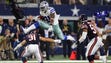 Cowboys running back Ezekiel Elliott (21) leaps over