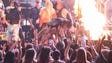 Lady Gaga crowd surfs during her performance with Metallica.