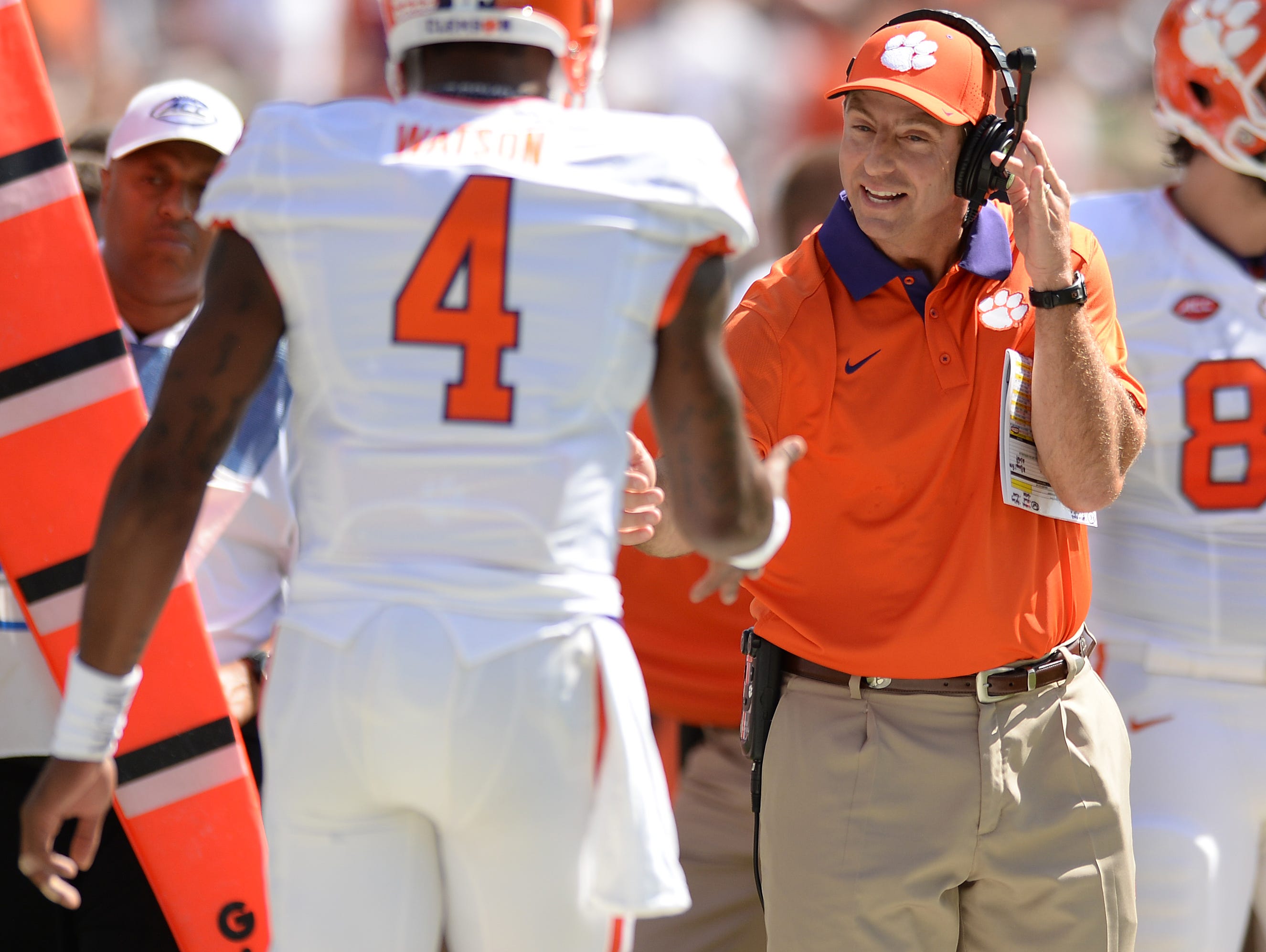 Clemson head coach Dabo Swinney is all smiles after quarterback Deshaun Watson (4) connected with tight end Jordan Leggett (16) for a TD against Miami during the 1st quarter Saturday, Oct. 24, 2015, in Miami Gardens, Fla.