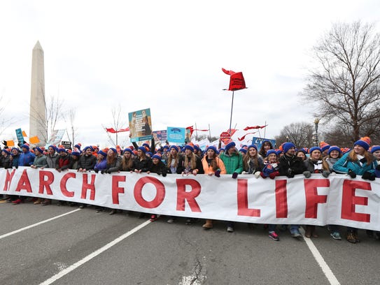 Participants in the March for Life march near the National