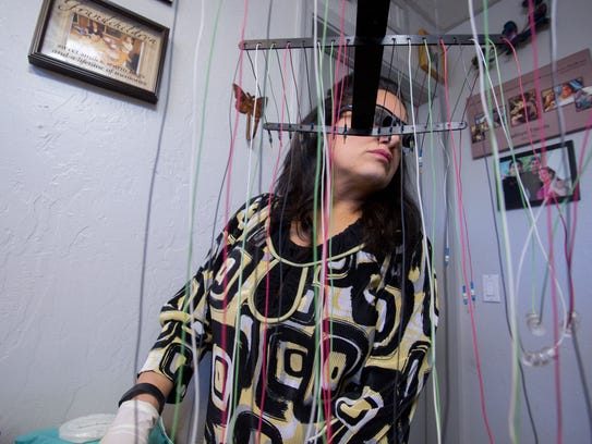 Owner of Senza Pelo Med Spa, Maria DeNicola, gets ready
