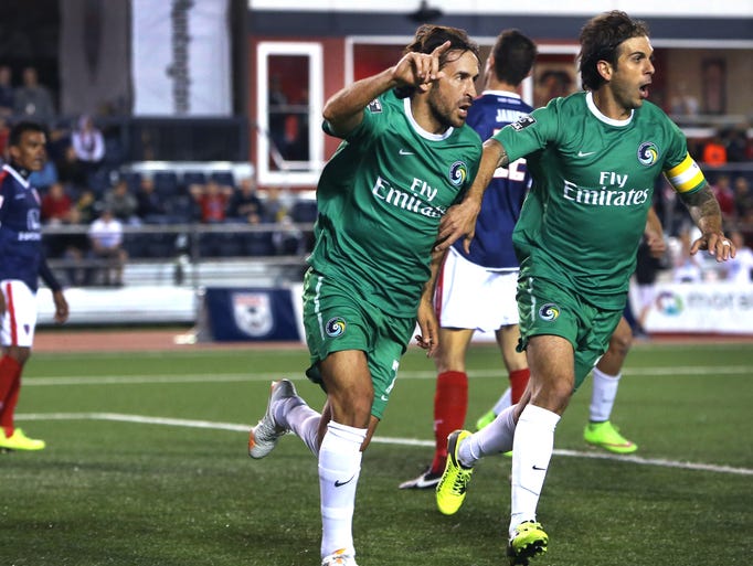 Raul celebrates his goal