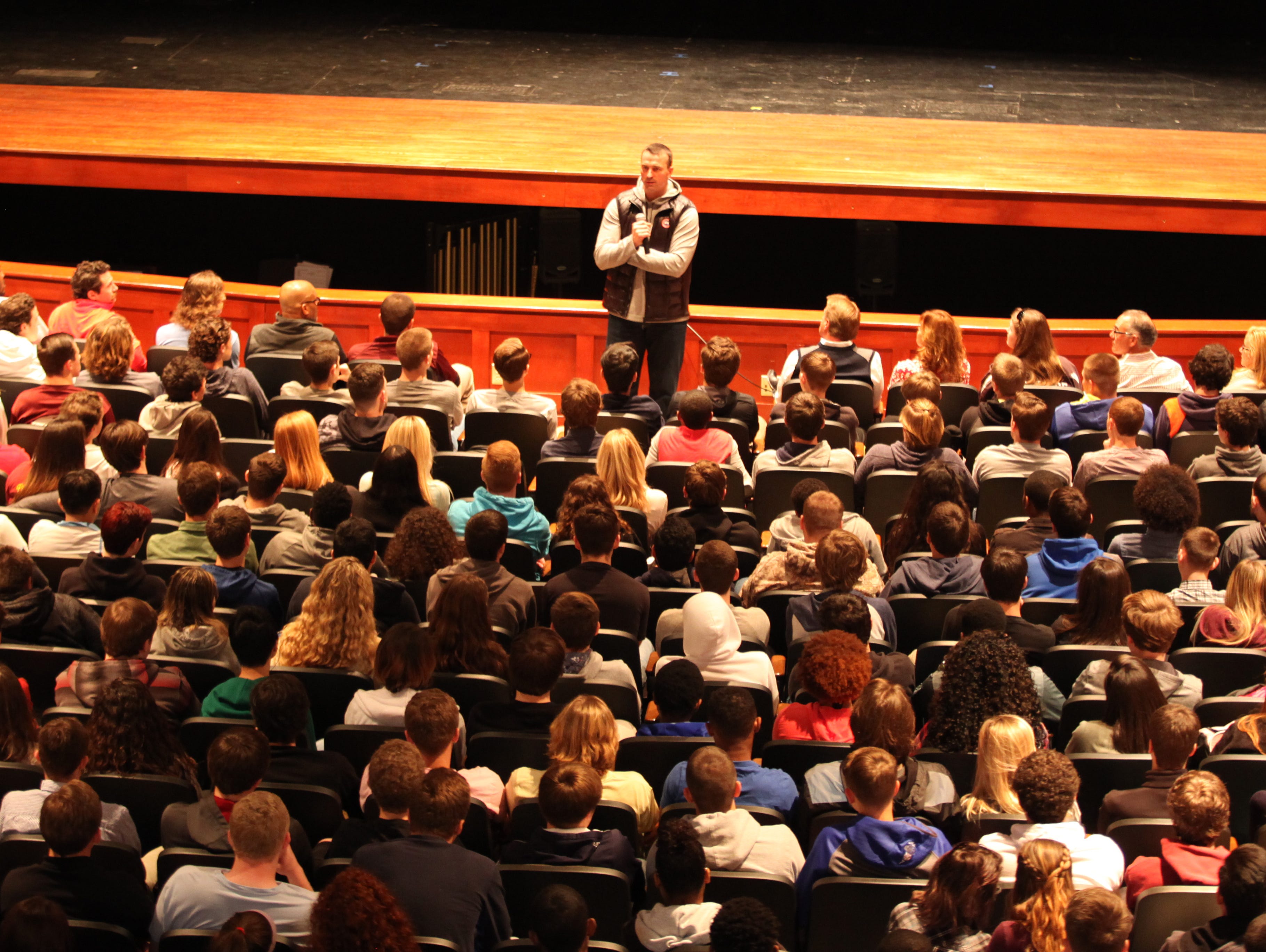 Former NBA player, Chris Herren, speaks to students at Appoquinimink High School Tuesday morning. Herren battled drug addiction throughout his basketball career.