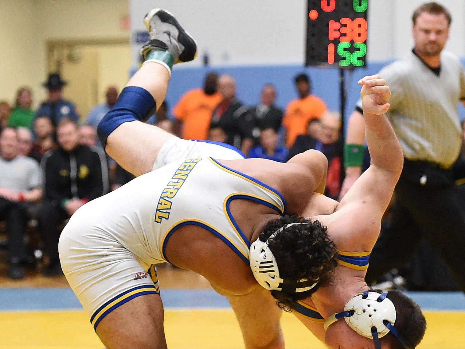 Brandon Bautista of Sussex Central (white) defeated Thomas Gallucci of Caesar Rodney 7-4 in the 152 lb class at the DIAA Individual Wrestling Championships held at Cape Henlopen High School near Lewes on Saturday February 27th.