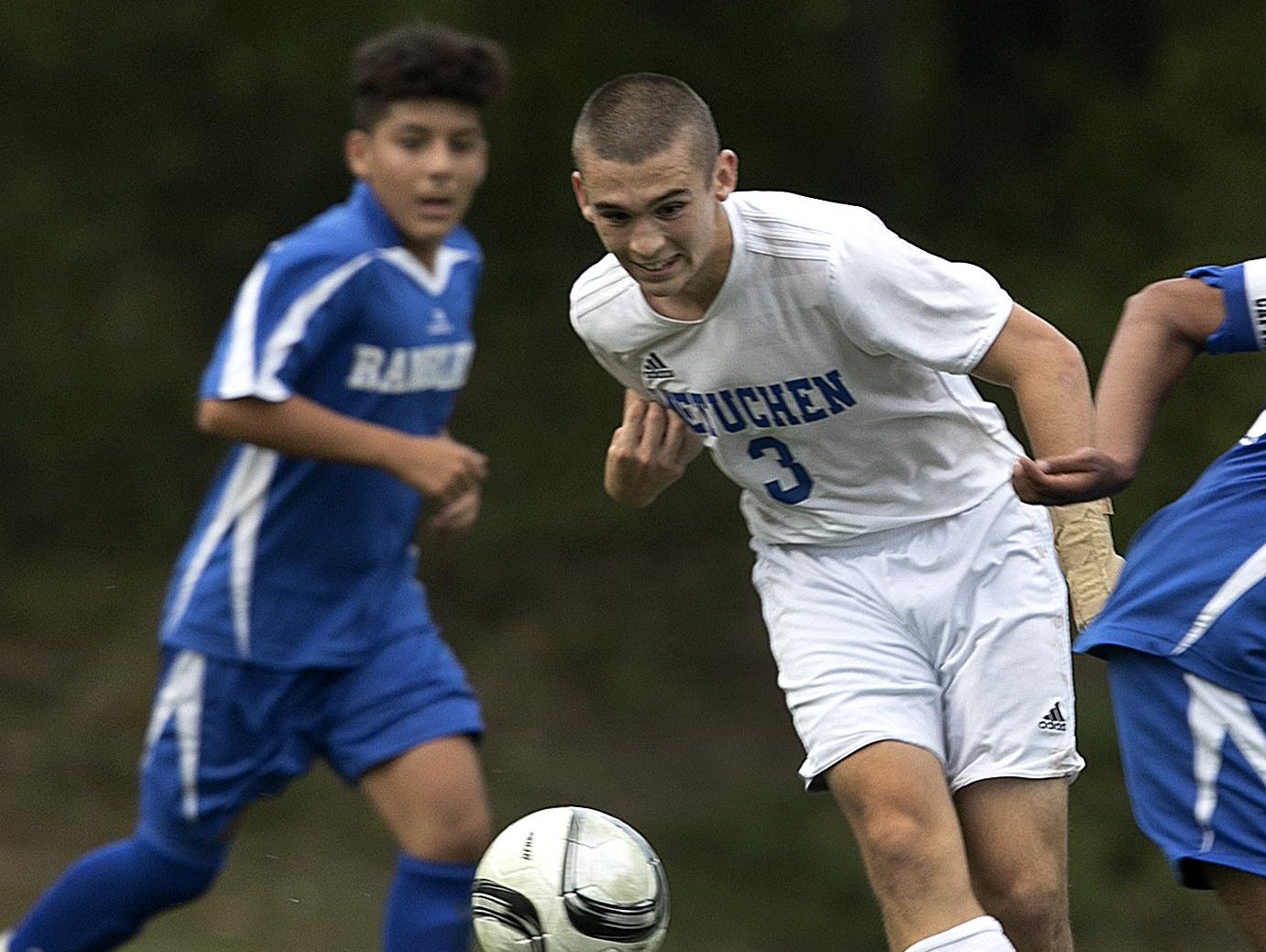 Metuchen’s Cameron O’Connell goes after the ball against Carteret on Monday.