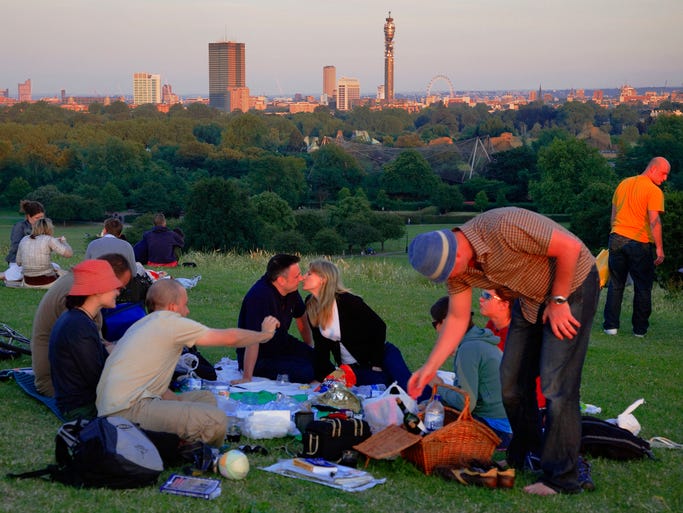 Travelers will find picturesque views over London on Primrose Hill where locals picnic in the evenings.