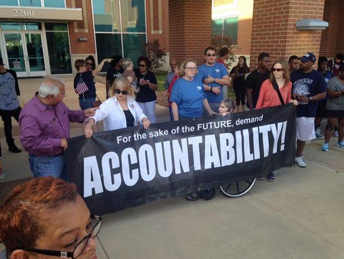 Protesters rallied outside McKinney police headquarters