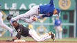 July 8: Cubs shortstop Addison Russell is upended as