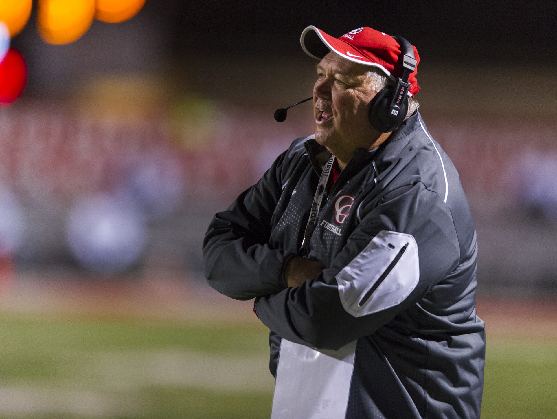 Center Grove coach Eric Moore has been loyal to his Wing-T offense.