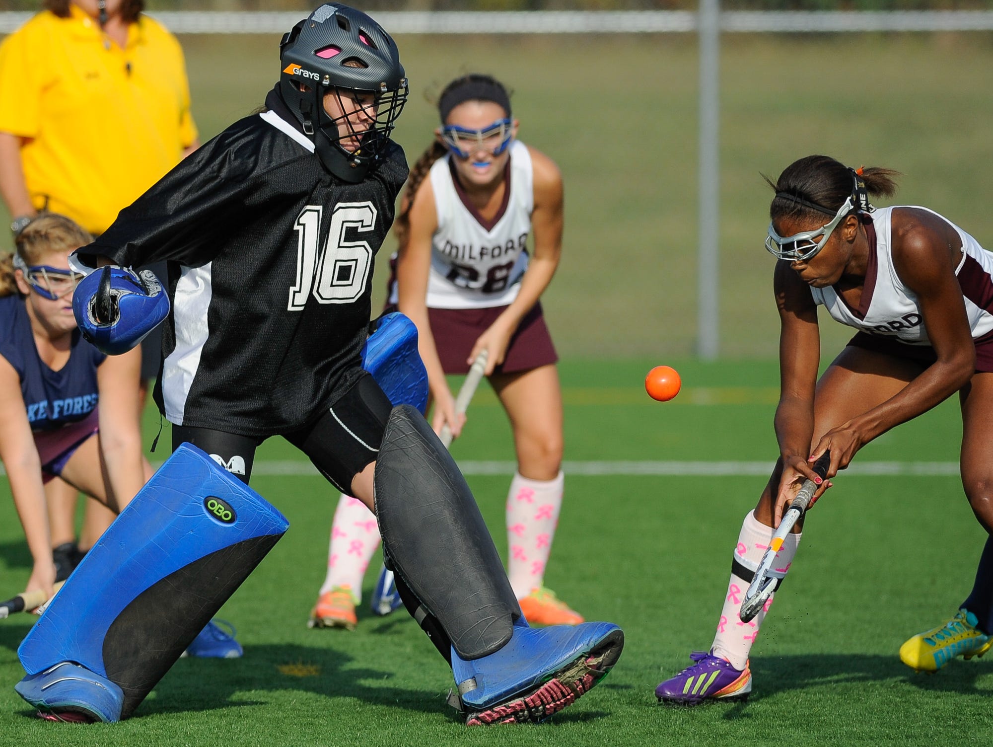 Lake Forest field hockey goalie Allison Bishop (No. 16) defends in their game against Milford.