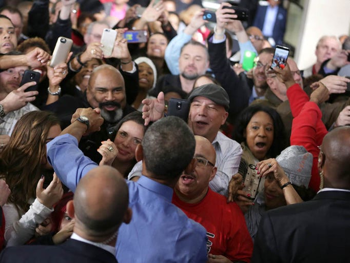 President Obama interacts with the crowd after delivering