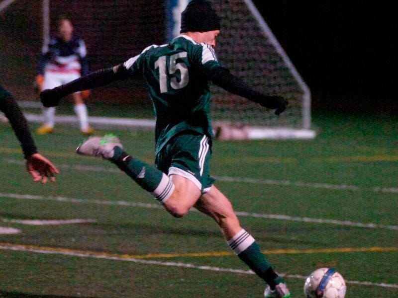 Senior captain Ari Hollander fires a shot at the opposing net.