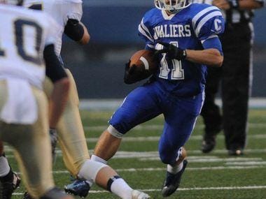 Chillicothe’s Nate Rosenbauer carries the ball against Teays Valley during Week 3 of 2015.