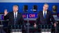 Donald Trump speaks as Bush reacts during the CNN Republican