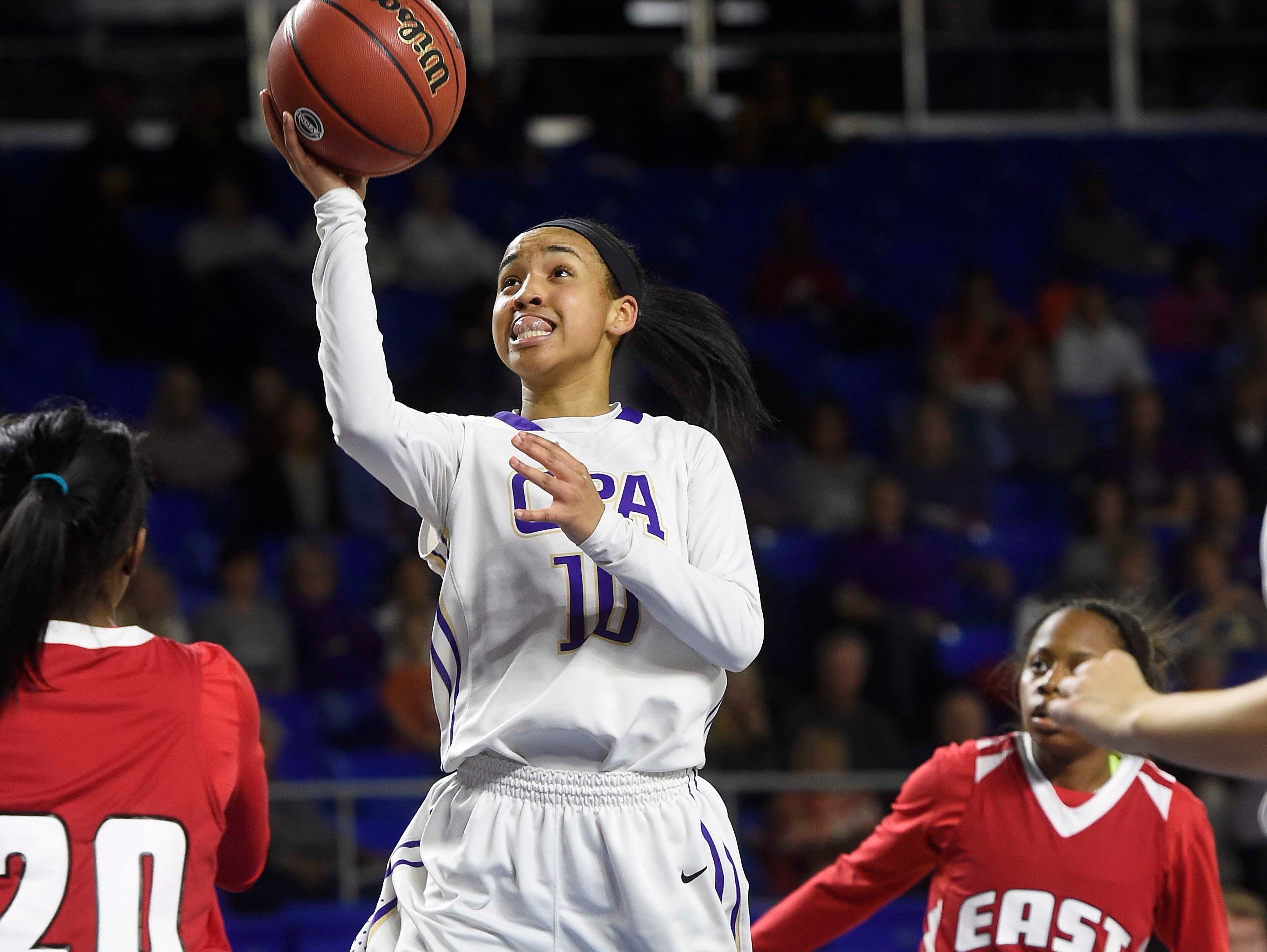 CPA's Kenedi Hambrick (10) drives the lane as East Nashville leads 25-24 at the half n the Division I Class AA Girl's basketball tournament at the Murphy Center on MTSU's campus March 10, 2016 in Murfreesboro, Tenn.
