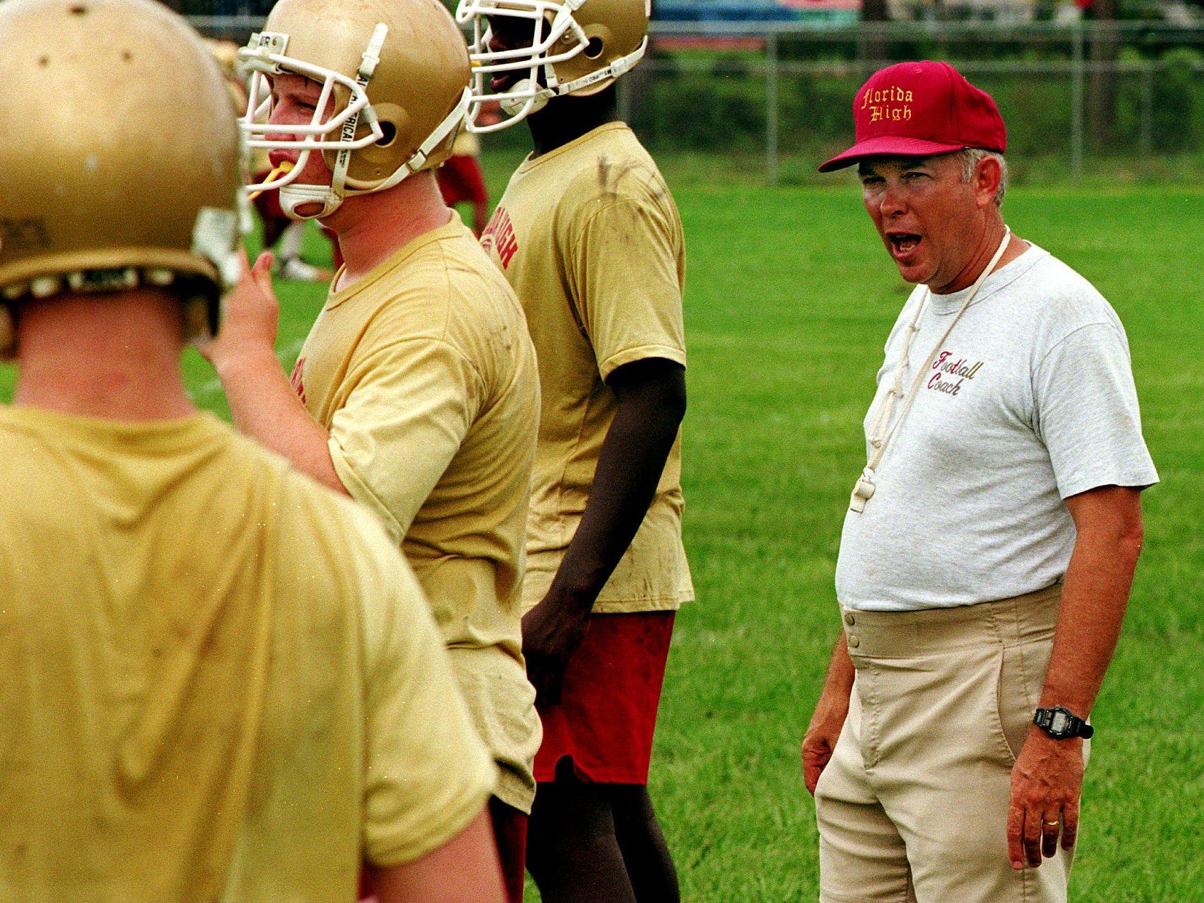 Mike Hickman coaches a football practice at an undetermined date prior to his retirement from coaching in 2006. Hickman became athletic director full-time. He’s now retiring fully, and the Seminoles’ football field was renamed in his honor for his 20 years of service to the school.