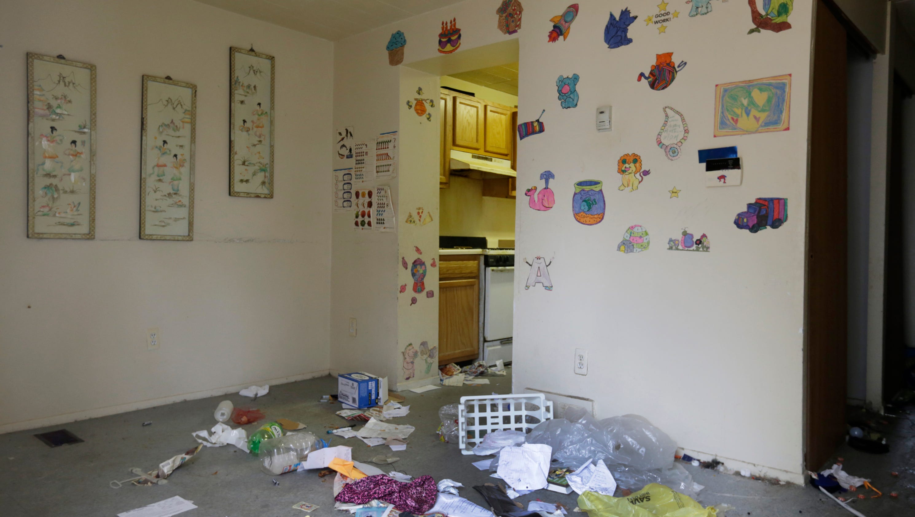 Eviction crew empties home of kids found in freezer