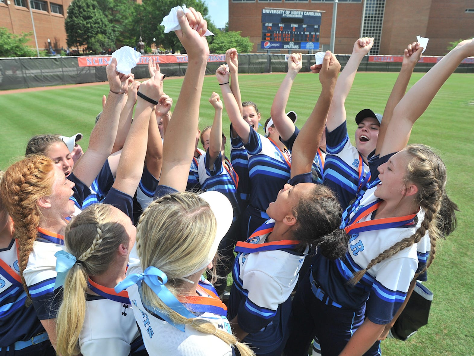 Enka softball players celebrate after repeating as the NCHSAA 3-A softball champions on Saturday in Greensboro.