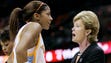 Summitt gives instructions to Candace Parker during