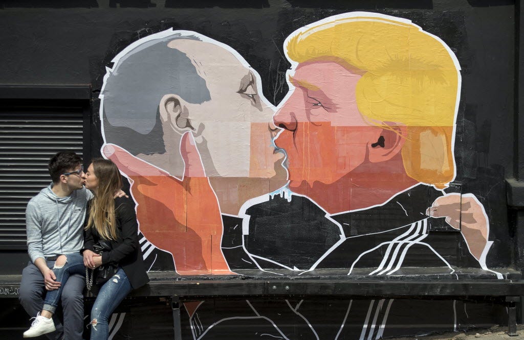 Putin Kissing Trump Mural Goes Viral Firstcoastnews Com