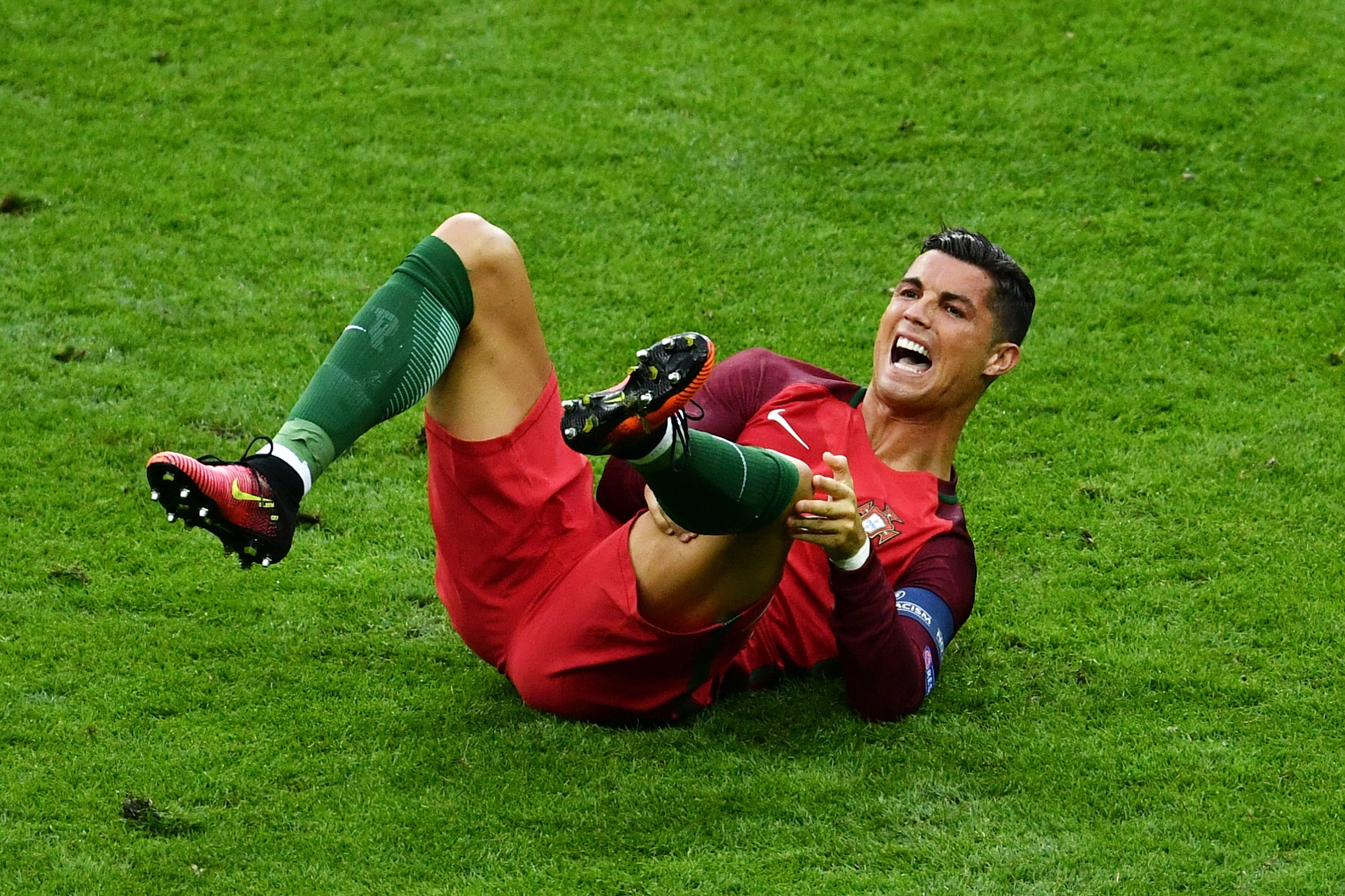 Portugal's Cristiano Ronaldo exits Euro final with apparent injury