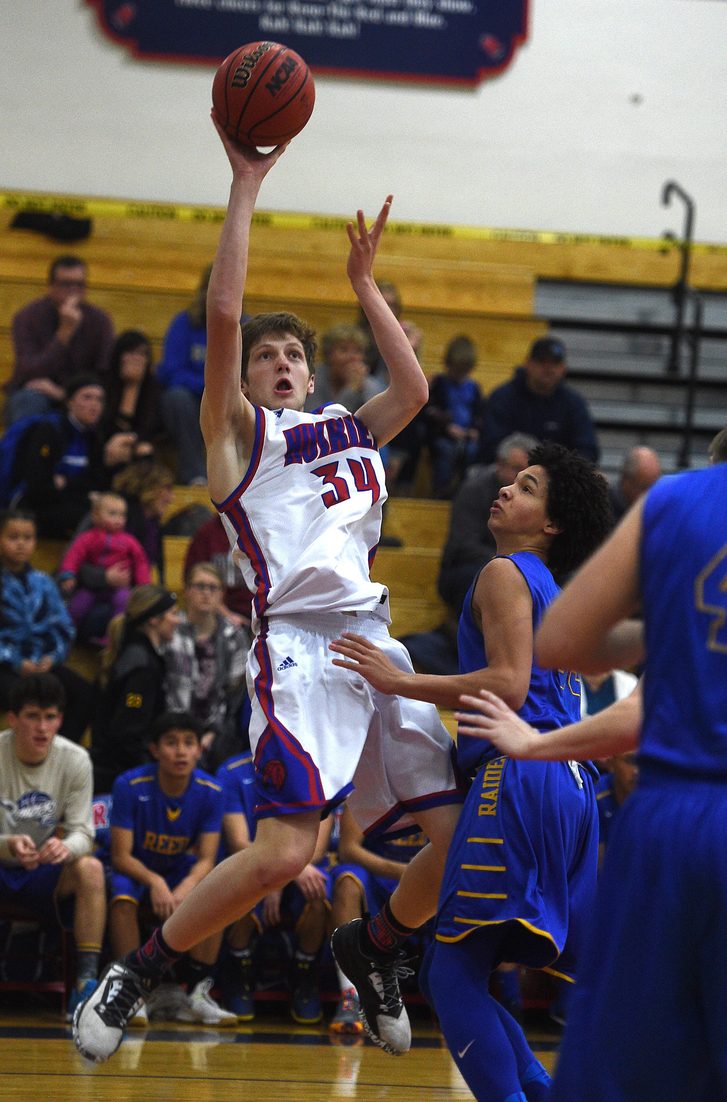 Boys basketball: Reno holds off Reed