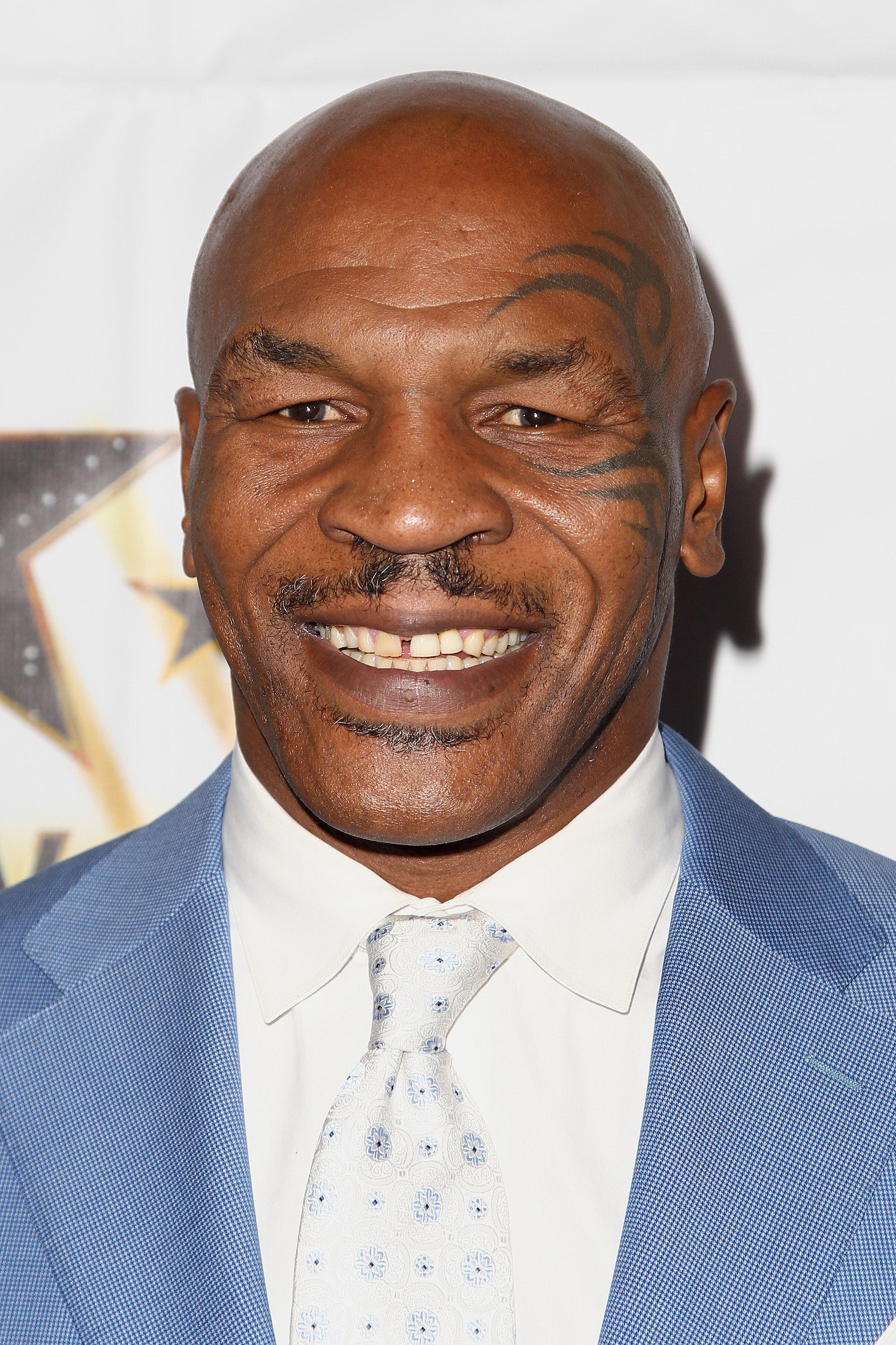 Mike Tyson disses Soulja Boy in new music video, claims he's training Chris Brown