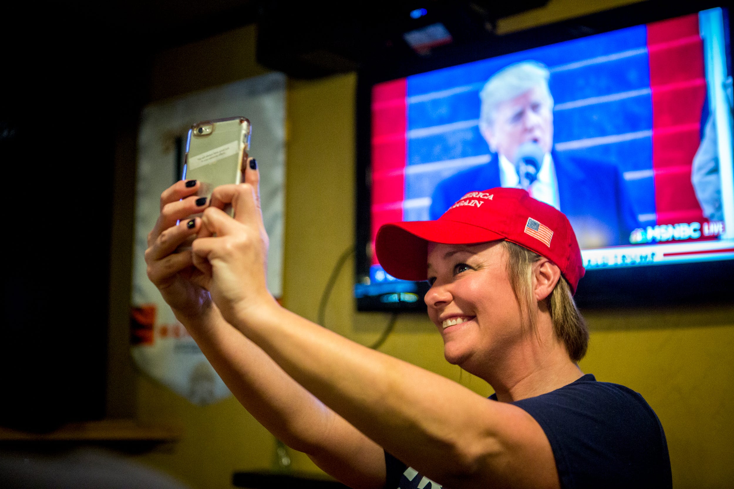Shots and selfies start Trump's term in Northern Kentucky