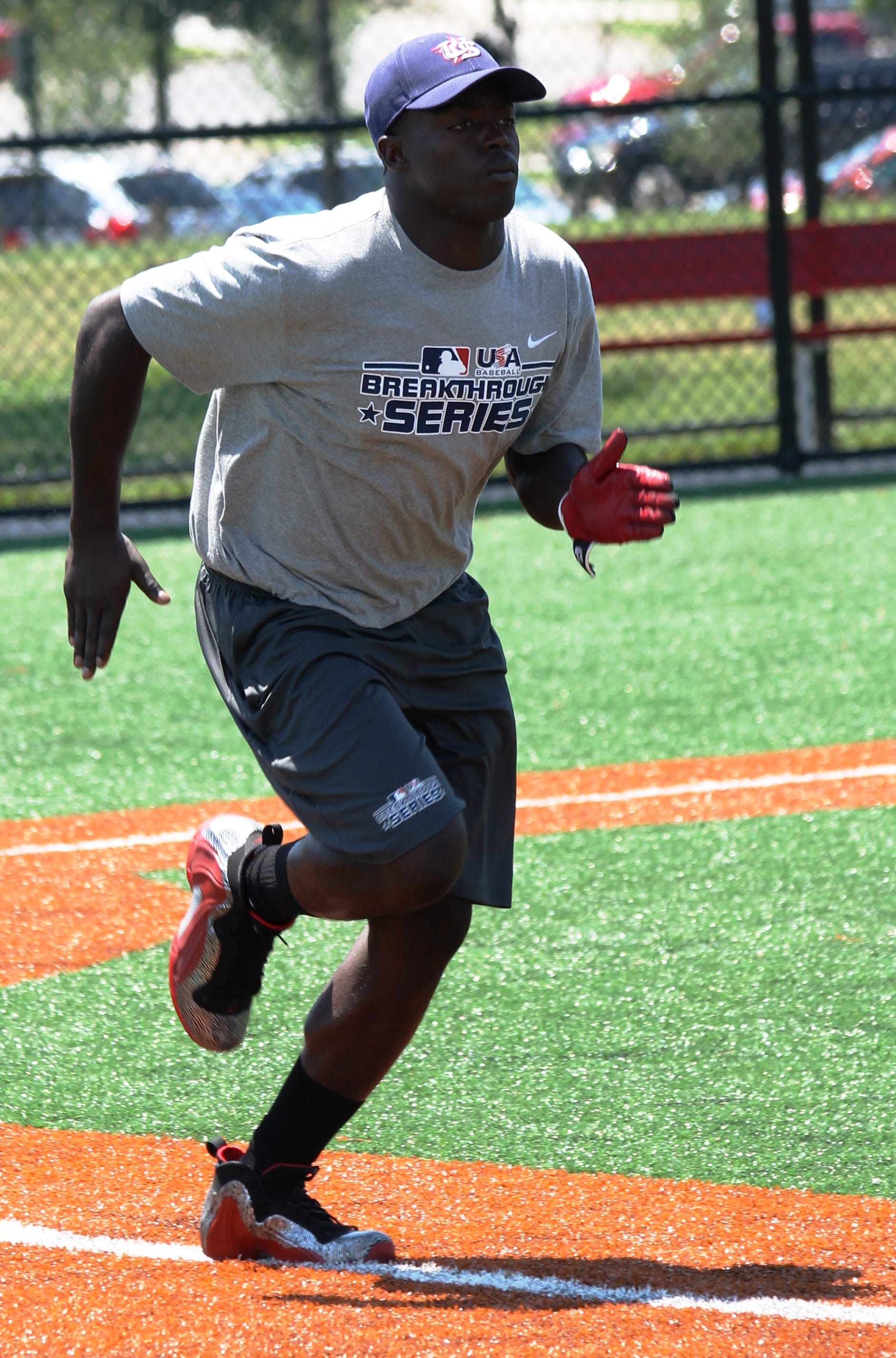 La Salle High School rising senior Phil Anderson of Price Hill runs the bases during the 2014 MLB Breakthrough Series baseball camp July 25.