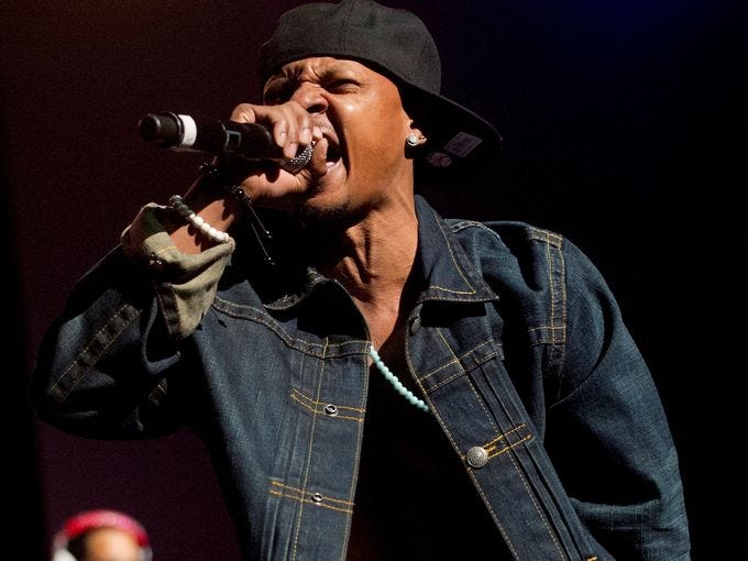 In this Feb. 23, 2013, photo Chris Kelly of the 1990s kid rap duo Kris Kross performs on stage at the Fox Theatre in Atlanta during the So So Def 20th Anniversary Concert. Kelly died of an apparent drug overdose at his home on Wednesday, authorities said.