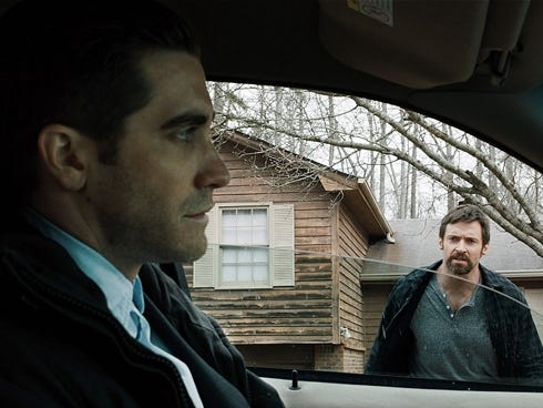 Jake Gyllenhaal, left, as Detective Loki and Hugh Jackman as Keller Dover in 'Prisoners.' In the film, the pair are at odds at the best way to investigate the kidnapping of Dover's daughter.