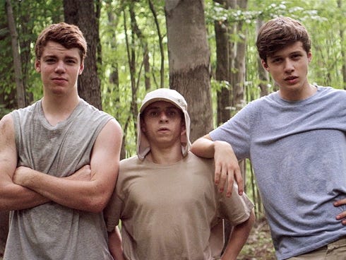 Gabriel Basso, left, Moises Arias and Nick Robinson choose to spend the season alone in the woods in 'Kings of Summer.'