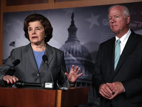 Chairman and Vice Chairman of the U.S. Senate Select Committee on Intelligence, Sen. Dianne Feinstein, D-Calif., left and Sen. Saxby Chambliss, R-Ga., speak to members of the media about the National Security Agency collecting phone records on Thursd