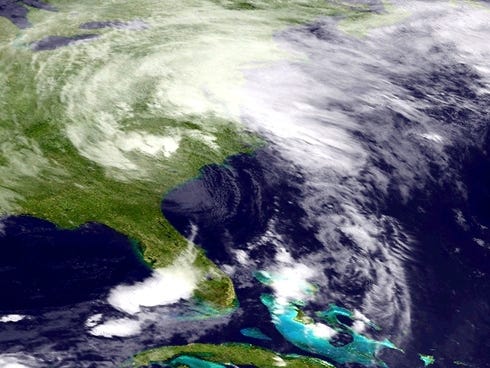 A satellite image shows Tropical Storm Andrea on Friday morning. The storm has maximum sustained winds of 45 mph and was moving to the northeast at 28 mph.