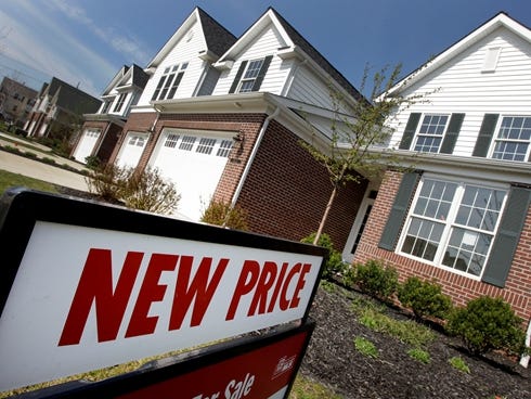 Newly-constructed homes are seen for sale with a new price in Pepper Pike, Ohio.
