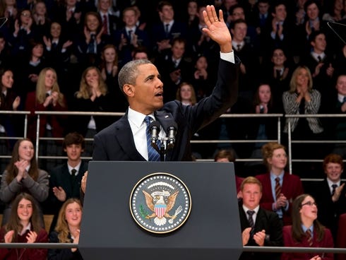 President Barack Obama waves as he arrives to deliver a speech at the Belfast Waterfront Hall on June 17, 2013, in Belfast, Northern Ireland.